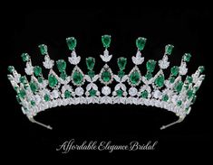 Emerald CZ Wedding and Quince Tiara You'll feel like royalty while wearing this exquisite tiara! Add a sparkling pop of color to your wedding day or quinceanera with this fabulous cz tiara. The intricately designed headpiece is plated in silver platinum and is decorated with brilliant 5A quality emerald green and clear cz crystals. The 2 1/2" height gives a majestic look to this stunning tiara. Size: 2 1/2" tall at its peak. Color: Silver/ Emerald Green/ Clear. Style: hp149. Please allow 3 weeks