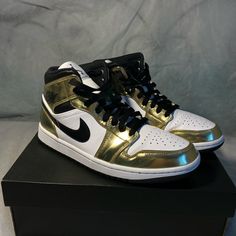 Ds Jordan 1 Mids Gold And White Jordan 1 Mids, Nike Jordan 1 Mid, Air Jordan 1 Mid Se, Nike Air Jordan 1 Mid, Gold Sneakers, Nike Gold, Newest Jordans, Air Jordan 1 Mid, Jordans For Men