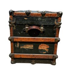 an old wooden trunk with painted designs on the front and sides, isolated against a white background