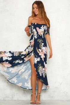 We've been hooked on our Kissed By A Rose Maxi Dress ever since we saw it! This style sits off the shoulder, has an elasticated bust and sleeves and it has ruffle details on the straight neckline and sleeves. It also has a tulip-style skirt for added floral flair. Wear yours with gladiator sandals style your hair in beach waves! Navy dress. Not lined. Cold hand wash only. Model is a standard XS and is wearing XS. True to size. Slightly stretchy fabric. Print placement may vary. Polyester. Rose Maxi Dress, Bodycon Floral Dress, Floral Dresses Long, Maxi Dress Navy, Long Sleeve Lace Dress, Long Sleeve Floral Dress, Straight Neckline, Festival Dress, Print Ideas