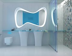 a modern bathroom with two sinks and a mirror on the wall over the toilet area