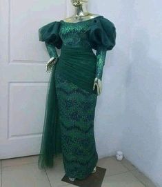 Green lace dress Luxury Green Lace Party Dress, Luxury Green Elegant Lace Dress, Traditional Luxury Gown With Lace Work, Luxury Traditional Gown With Lace Work, Emerald Green Lace Bridesmaid Dresses African, Luxury Green Lace Dress, Luxury Green Lace Dress For Party, Luxury Semi-stitched Lace Work Gown, Lace Sleeves Fitted Bodice Dress For Prom Season