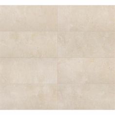 a white tile wall with four squares in the middle and one square at the bottom