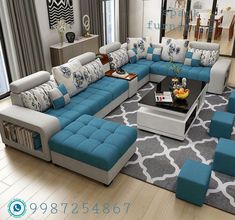 a living room filled with lots of blue and white furniture