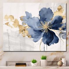 blue and gold flower painting on white wall