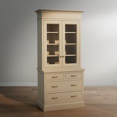 a tall white cabinet with glass doors on the top and bottom, sitting on a hard wood floor