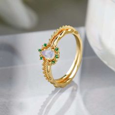 Take a daring chance with this 14K Gold Opal Ring Set - 2 rings in 1! Ride the waves of life with the stunning teardrop opal stones, decorated with vibrant green zircon. Embrace your inner royalty with these crowning pieces, perfect for the adventurous Libra in October! ----------- DESCRIPTIONS -----------▪ Gemstone: Natural Opal▪ Gem Size: 7mm▪ Stone Shape: Teardrop▪ Ring Size: US5 - US8▪ SKU: TB2154▪ Material: 925 Sterling Silver, 14K Gold, Natural Opal ----------- MEANING -----------♥ Zodiac: Spiritual Gold Opal Ring Birthstone, Gold Multi-stone Opal Ring For Formal Occasions, Gold Spiritual Opal Ring, Luxury Gold Opal Ring With Cabochon, Mismatched Earrings Studs, 14k Gold Opal Ring, Luxury Multi-stone Opal Ring In 14k Gold, Opal Birthstone, Nose Rings Hoop