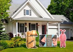 a house that has some pictures of people in costumes on the front and side of it