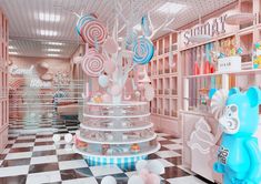 the candy shop is decorated in pink and blue