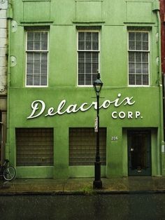 a black and white photo of the delaccioa corp building in new york city