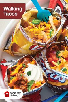 a bowl filled with lots of tacos and chips