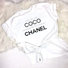 White Cotton T Shirt With Black Lettering, Relaxed Fit. Sleeves Are Standard And Can Be Rolled Up, Cute For Layering And Leggings. Chanel Shirts Women, Chanel T Shirts Women, Boujee Shirts, Typography Clothing, Chanel Tee, Chanel Pin, Brunch Outfits Fall, Chanel T Shirt, Mommy Clothes