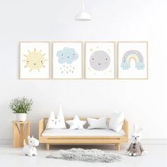 a living room with three pictures on the wall and two stuffed animals next to it