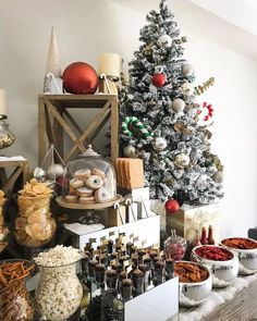 a christmas tree is surrounded by many different foods