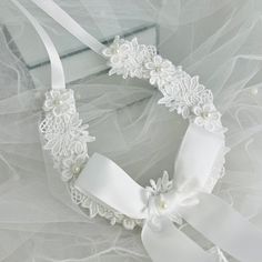 CHARLOTTE - Ivory or Off White Lace Bridal Horseshoe Good Luck Charm A beautiful satin horseshoe covered with lace and  pearls. This horseshoe is a traditional size of 12cm wide x 13cm high Feel free to look at all of my beautiful stock on one of my pages. www.bejewelledbridal.com.au www.facebook.com/bejewelledbridal.com.au www.instagram.com/bejewelled_bridal Thank you for visiting Bejewelled Bridal White Lace Bridal Accessories For Wedding, Elegant Lace Bridal Accessories, Elegant Lace Bridal Accessories For Wedding, Elegant Lace Bridal Accessories For Marriage, White Lace Wedding Shoes For Bride, Lace Bridal Accessories For Ceremony, Cream Lace Bridal Accessories For Wedding, White Bridal Accessories For Ceremony, White Lace Wedding Shoes