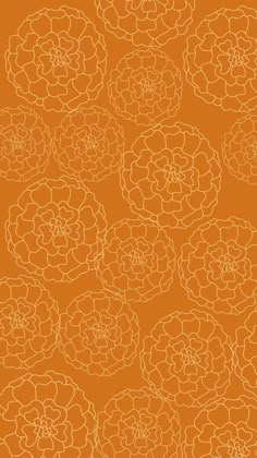 an orange and white flower pattern with lines on the bottom, as well as two smaller flowers