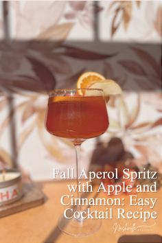 fall aperol spritz with apple and cinnamon easy cocktail recipe on the table