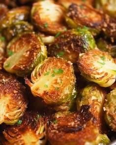 brussel sprouts with garlic and parsley in a pan ready to be cooked