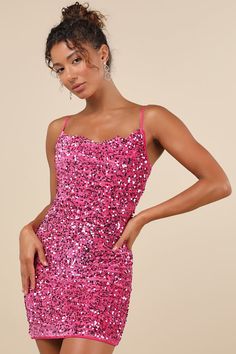 Admirers will flock and jaws will drop when you arrive in the Lulus Dazzling Vibe Magenta Pink Velvet Sequin Mini Bodycon Dress! Plush velvet, adorned with sparkling pink sequins, shapes this eye-catching dress that falls from slender, adjustable spaghetti straps into a cowl neckline. The fitted bodice continues into a bodycon skirt that ends at a flirty mini hem. Hidden back zipper/clasp. Fit: This garment fits true to size. Length: Mid-thigh. Size medium measures 27.13" from adjustable straps to hem. Bust: Great for any cup size. Waist: Fitted - very fitted at natural waist. Hip: Fitted - stretchy fabric allows room for hips. Undergarments: May be worn with a strapless bra, adhesive bra, petals, or no bra. Fabric: Fabric is very stretchy. Fully lined. Shell: 95% Polyester, 5% Spandex. Li Magenta Hoco Dress, Sequin Homecoming Dress, Pink Sequin Dress, Cute Homecoming Dresses, Mini Bodycon Dress, Bodycon Skirt, Magenta Pink, Cowl Neckline, Sequin Mini