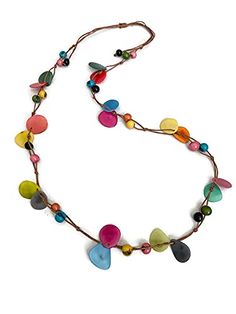 PRICES MAY VARY. Handmade 36 inches long Adjustable to shorter length Multi Color Tagua Nuts and Acai Multi-Color Tagua Long Necklace Ecuadorean Tagua Jewelry - Eco Friendly Color: Multi-Color Part Number: TAG695 Item Weight: .65oz Product Length: 36 inches long About Tagua This Product is handcrafted from a palm tree nut native to the lush tropical rainforests of Ecuador. Also referred to as the Ecuadorean palm tree, the Tagua tree produces several bushels of seed pods a year with up to 100 Tag Adjustable Multicolor Lariat Long Necklace, Multicolor Jewelry With Adjustable Cord, Knotted Jewelry, Playful Jewelry, Natural Things, Cotton Jewelry, Multi Coloured Necklaces, Tagua Jewelry, Whimsical Jewelry