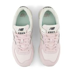 Women's New Balance 574 - Pink/Granite/Moonbeam ‘The most New Balance shoe ever’ says it all, right? No, actually. The 574 might be our unlikeliest icon. The 574 was built to be a reliable shoe that could do a lot of different things well rather than as a platform for revolutionary technology, or as a premium materials showcase. This unassuming, unpretentious versatility is exactly what launched the 574 into the ranks of all-time greats. As hybrid road/trail design built on a wider last than the Pink New Balance Shoes, New Balance 574 Pink, New Balance Shoe, Pink Granite, Trail Design, Punk Boots, Cute Sneakers, New Balance 574, Best Running Shoes