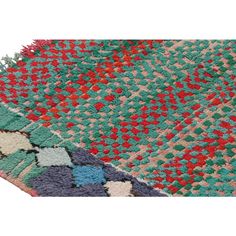 an area rug with various colors and patterns