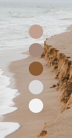 the beach is lined with sand and white circles