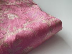 * If you want to keep an eye on your order please add the track and trace option to order  * Description: This  is a new brocade, with raw (shantung) silk. It's the great combination of the lusciousness of raw silk and golden brocade flowers. This is a great combination in pink and gold! What is the fabric like? This is a raw silk brocade. The golden brocaded flowers you see in the fabric are metal entwined threads.  color:  pink, gold  weight: 143 per yard possible purposes: skirt, dress, cushi Shantung Silk, Rosa Gold, Indian Fabric, Silk Brocade, Skirt Dress, Raw Silk, Pink Gold, X 23, Or Rose