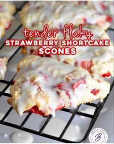 strawberry shortcake scones with icing on a cooling rack