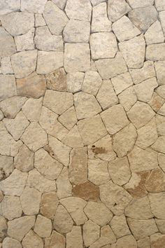 an image of a stone wall that looks like it is made out of rocks