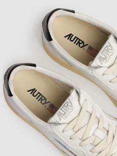 Find AUTRY Medalist Low Sneakers on Editorialist. Leather upper. Front lace-up closure. Logo details. Rubber sole Sport Swimwear, Sports Sweatshirts, Crossbody Messenger Bag, Sports Brands, Low Sneakers, Swim Accessories, Shearling Jacket, Sport Bag, Sport Pants