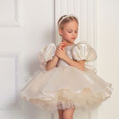 Make your little girl's special day even more magical with the DreamyVow Elegant Flower Girl Dress. This stunning gold dress is perfect for birthdays and weddings, and will have your child feeling like royalty. With its elegant design and high-quality material, this dress will make any occasion unforgettable. Prom Dress Satin, Elegant Flower Girl Dress, Ivory Girls Dress, Yellow Evening Dresses, Silver Evening Dress, Purple Evening Dress, Gold Evening Dresses, Green Evening Dress, Girls Dress Shop