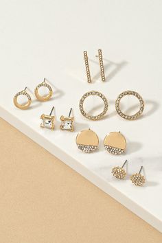 Get geometrically chic with this set of six pairs of stud earrings in playful and unique shapes. From circles to triangles, these earrings add a playful edge to any look. Unique Shapes, Gold Earrings Studs, Silver Earrings Studs, Triangles, Circles, Gold Earrings, Silver Earrings, Stud Earrings, Silver