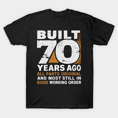 a black shirt with the words built 70 years ago and most still in good working order