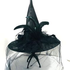 Halloween Witch's Hat Black Roses Feathers Spiders Great Detail Good Preowned Condition - Looks Unused. Lots Of Detail In This Hat. Blacky Satiny Fabric. Black Feathers. Black Roses. Black Tulle Bow W/Pom-Poms. Black Veil With Spiders. Wire Rim. Measures 15 X 18. Great Display Piece Or Costume Accessory. Experienced Seller. Fast Shipping - Usually Ships Within 24 Hours. Tulle Witch Hat, Tulle Bow, Roses Black, Halloween Makeup Inspiration, Halloween Witch Hat, Tulle Bows, Black Roses, Black Tulle, Black Veil