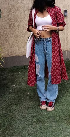 baggy jeans, crop white tee n a long jacket. basically 'i love reading n am mature' vibes Streetwear Fashion Indian Women, Traditional Aesthetic Outfits, Ethinic Dresses For College, Aesthetic Indo Western Outfits, Traditional Casual Outfits, Indian Aesthetic Outfit Casual, Indian College Fits, Desi Summer Outfits, Desi Casual Outfits Aesthetic