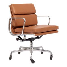 an office chair with brown leather upholstered seat