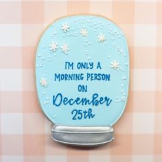 a decorated cookie with the words i'm only a morning person on december 25th