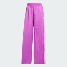 adidas Adicolor Satin Wide Leg Track Pants - Purple | Women's Lifestyle | adidas US Sports Bottoms With Side Stripes For Spring, Sporty Bottoms With Side Stripes For Spring, Adidas Sportswear Pants For Spring, Sporty Adidas Logo Pants, Adidas Relaxed Fit Pants With Logo, Adidas Relaxed Fit Pants, Spring Sportswear Bottoms With Side Stripes, Three Stripes Relaxed Fit Sportswear Pants, Relaxed Fit Three Stripes Sportswear Pants