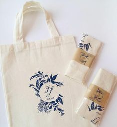 a tote bag and two bags with labels on them