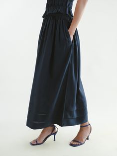 This skirt is an ideal staple for spring and summer, with a flowy, easy silhouette. The hemline has a special tiered detail, and the front waistband is flat, but the back is elastic for added comfort! Herbal Garden, Easy Silhouette, Lounge Party, Best Gift Cards, Clothing Staples, Denim Sweater, Summer Stripes, Linen Shop, Summer Staples