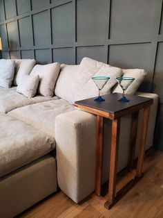 a couch with two martini glasses on it