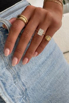 a woman with two rings on her fingers