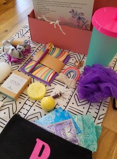 the contents of a personal care kit laid out on a table