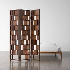 the room divider is made out of wood