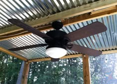 a ceiling fan that is on top of a wooden structure with the words smart diy tips