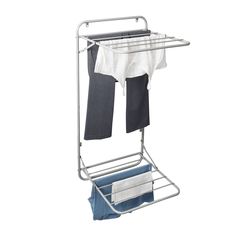 an over the door drying rack with two folded shirts hanging from it's sides