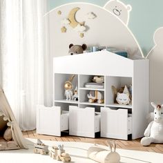 a child's room with white furniture and toys