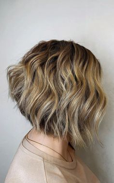 Stacked choppy bob with blonde balayage, featuring layered texture and a dimensional finish Stacked Choppy Bob, Bold Haircut, Blended Highlights, Bold Haircuts