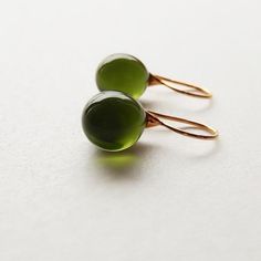 Cheap Glass Earrings With Round Beads, Elegant Drop Glass Jewelry, Elegant Drop-shaped Glass Jewelry, Elegant Glass Drop Jewelry, Everyday Green Glass Jewelry, Glass Drop Earrings With Matching Set, Elegant Glass Drop Earrings, Everyday Round Glass Jewelry, Modern Green Drop Jewelry